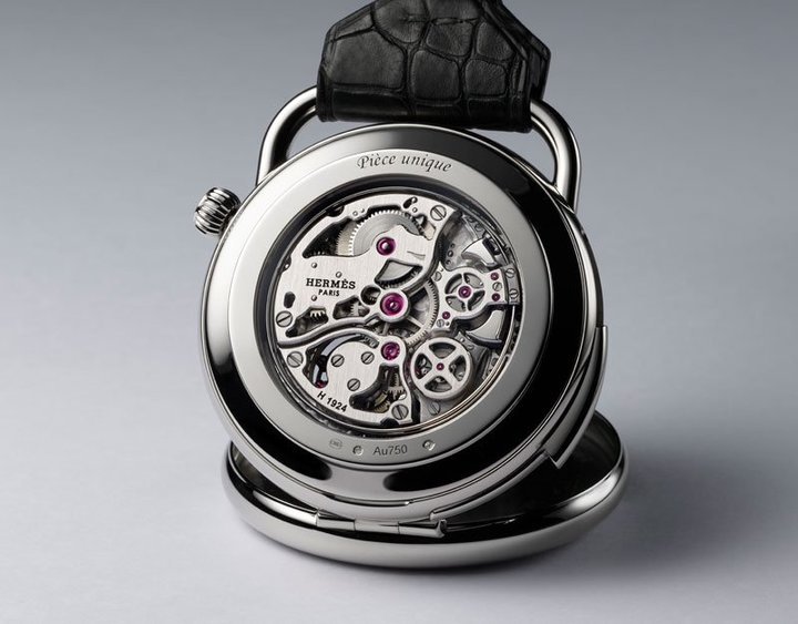 The Hermès H1924 flying tourbillon minute repeater movement in its white gold case. 