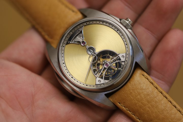 The AK03 Tourbillon Chiming Jump Hour. The entire movement's visible and non-visible parts have been hand finished using classical techniques such as: anglage, black polish, perlage, Côtes de Genève, Hand graining and polishing, hand engraving.